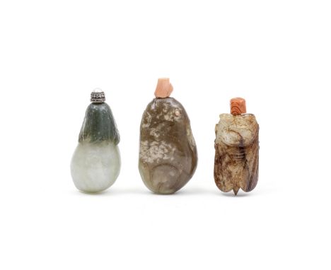 A GROUP OF THREE JADE SNUFF BOTTLESQing DynastyComprising: a pale green gourd bottle with pearl stopper, a pale and russet ja