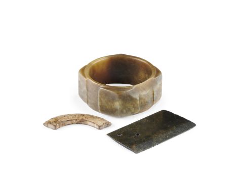 THREE ARCHAISTIC JADE CARVINGSIncluding: a yellow jade cong, a dark green jade ritual axe and a mottled jade huang pendant, o