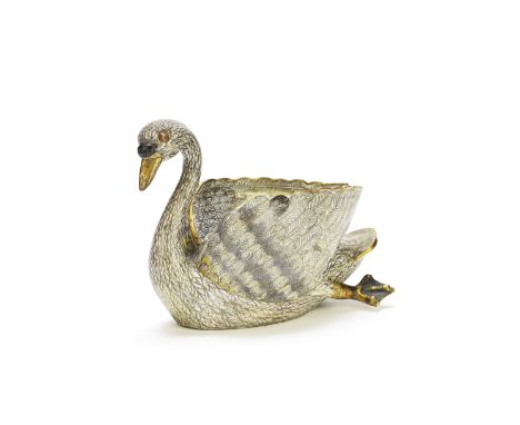 A CLOISONNÉ-ENAMEL 'SWAN' INK WELL19th centuryModelled as a white enamelled swimming swan, with elegantly curved neck holding