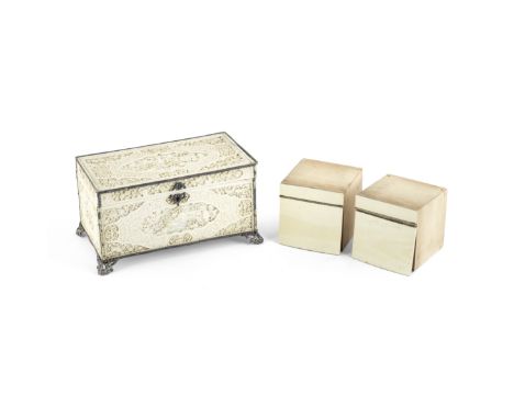 A CARVED IVORY CADDY AND HINGED COVEREarly 19th centuryOf rectangular form, elaborately carved with cusped panels of pavilion