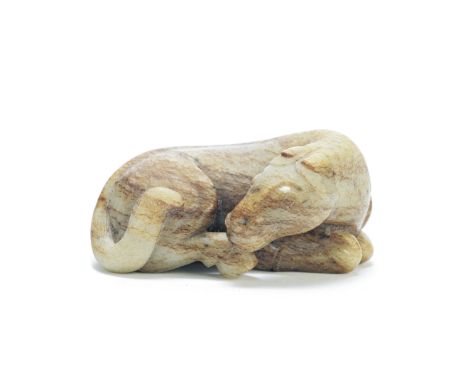 A JADE CARVING OF A HORSEThe stone of pale green hue with extensive russet inclusions, the beast naturally modelled recumbent