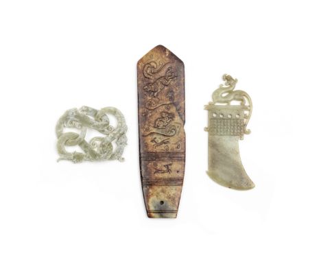THREE ARCHAISTIC JADESComprising: a yellow and russet jade ritual axe with archaistic style inscriptions in between two chilo