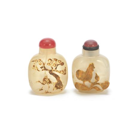 TWO CAMEO-CUT AGATE SNUFF BOTTLESQing DynastyEach deftly incorporating the naturally-occurring russet-coloured inclusions wit