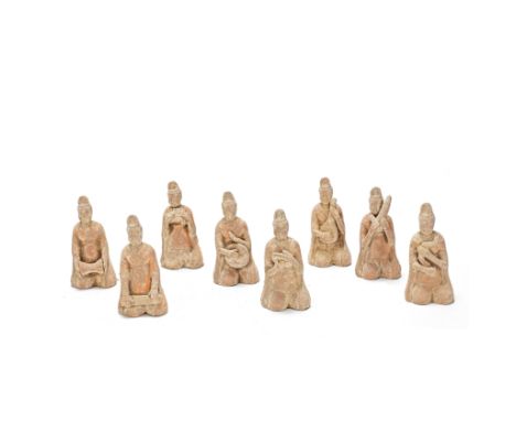 A GROUP OF EIGHT POTTERY COURT MUSICIANSTang DynastyComprising eight male musicians, each with the same hat and robe, kneelin