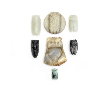 A GROUP OF SEVEN JADE AND ONE JADEITE CICADASLate Qing Dynasty and laterComprising: a Han-style mottled grey, creamy-white an
