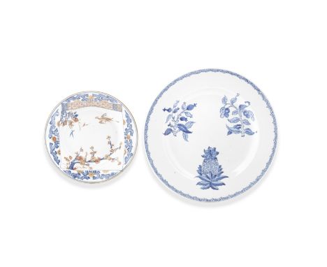 A VERTE-IMARI DISH AND AN UNUSUAL BLUE AND WHITE 'BOTANICAL' CHARGER18th centuryThe verte-Imari dish decorated in underglaze 