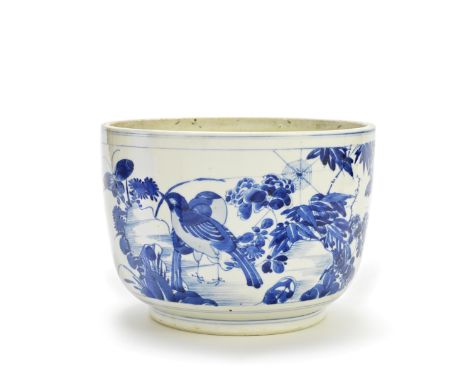 A BLUE AND WHITE DEEP BOWLKangxiDecorated with rectangular panels, to one side with a pair of jays and butterflies amidst roc