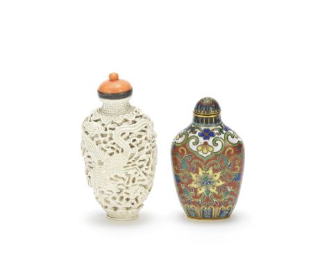 A CARVED SOFT-PASTE PORCELAIN 'DRAGON AND PHOENIX' SNUFF BOTTLE AND A CLOISONNÉ-ENAMEL BOTTLEQing DynastyThe first of tapered