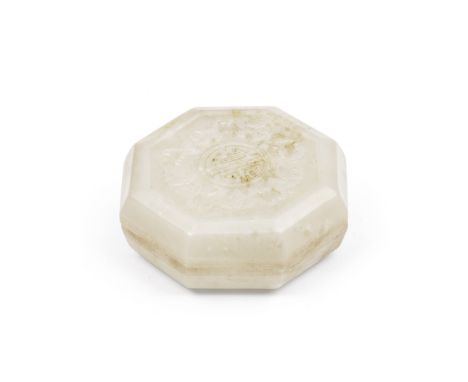 A PALE JADE OCTAGONAL BOX AND COVERQianlong four-character seal markCarved in relief to the surface with five bats surroundin