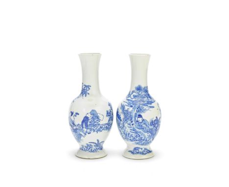 AN ASSOCIATED PAIR OF BLUE AND WHITE BALUSTER VASESLate Qing DynastyEach painted in the Kangxi style, the first with a schola