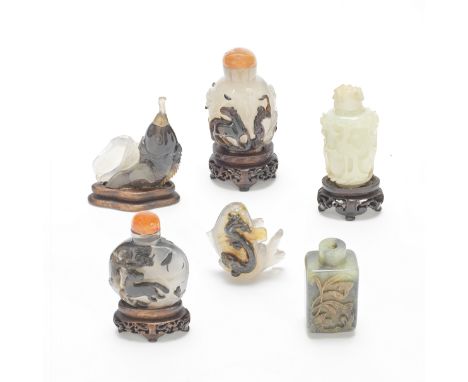 TWO JADE AND FOUR AGATE SNUFF BOTTLESQing DynastyComprising: a pale green jade bottle and stopper on wood stand and a mottled