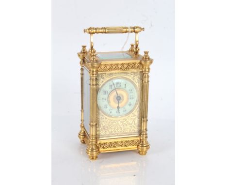 French brass carriage clock, having foliate engraved dial with enamel chapter ring and arabic numerals, within fluted columns