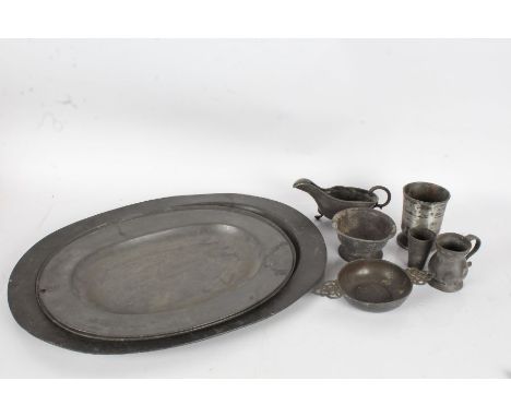 Collection of 18th and 19th century pewter, to include four meat plates, one engraved GIV below a crown, sauce boat, cup etc.