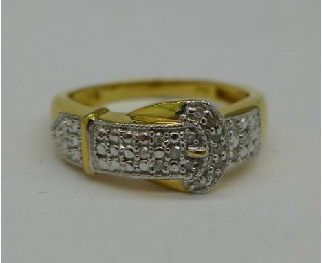 A silver gilt, sixteen diamond buckle ring, R