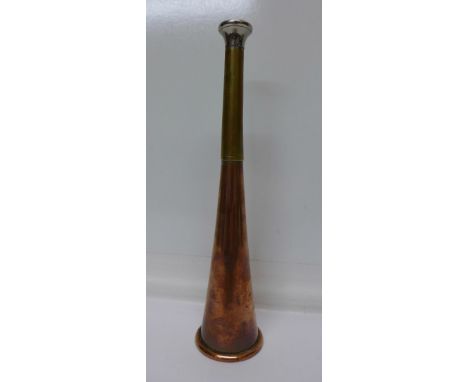 A late Victorian/Edwardian copper and brass hunting horn by Geo. Parker & Sons, Saddlers, London, W.C., length 23cm