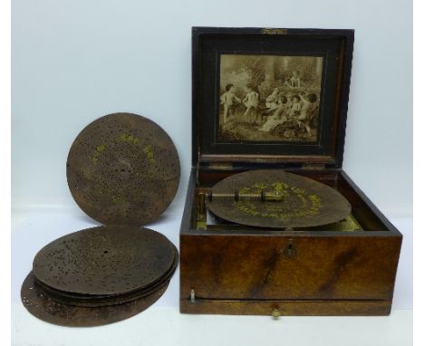 A 19th Century polyphon, disc playing music box, 9½" discs, with ten discs