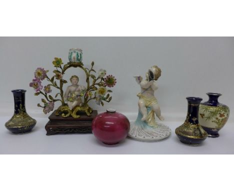 A Satsuma vase, a pair of vases, a continental globular vase, a continental figural candlestick and one other continental fig