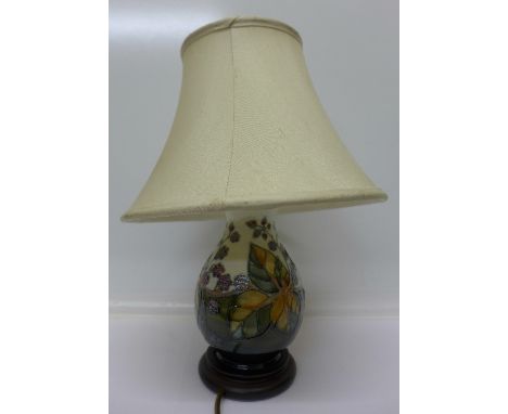 A Moorcroft table lamp base with shade, 22cm