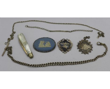 A silver Albert chain, 28.1g, a Wedgwood brooch, a silver and mother of pearl penknife, a silver fob by Fattorini and a Victo