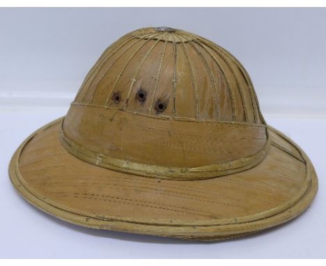 A Colonial bamboo leaf pith helmet