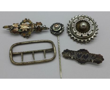 Three silver brooches including two Victorian, two silver stick pins and a Georgian silver buckle