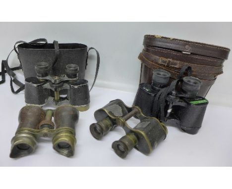 Four pairs of binoculars including one WWI period with broad arrow marks and one signed Greens