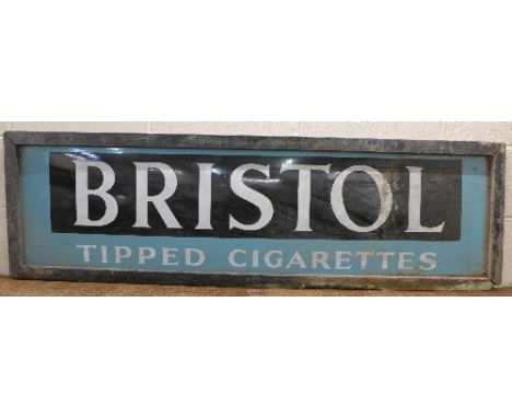 A single sided rectangular enamel metal advertising sign "Bristol Tipped Cigarettes" in original wood frame, width 156cm
