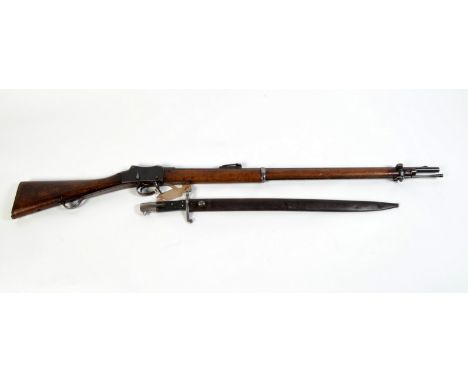 THE BRIAN WHIPP COLLECTION

A Martini Henry rifle dated 1897 Number 1557, the trigger guard lever marked beneath a crown E29 