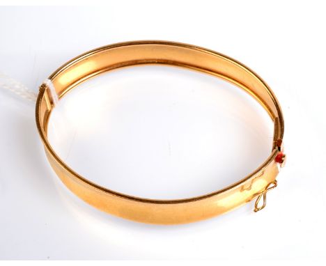 A Swedish 18ct. gold plain hinged bangle, 15.6g. 