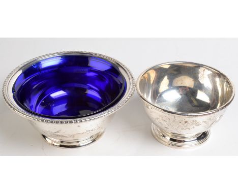 A Birks Sterling silver bowl with beaded rim and blue glass liner, maximum diameter 12.7cm, together with a smaller Birks Ste