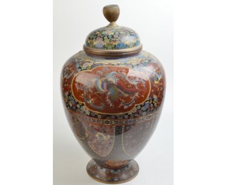 A large Japanese cloisonne ovoid jar and cover, height 52cm, damage. Condition Report: Much damage: one side buckled, lid fin