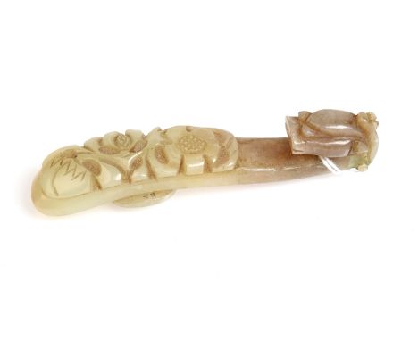 A Chinese carved jade belt hook.