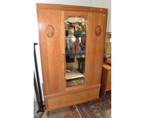 A good 1920's light oak bedroom suite, comprising a wardrobe 114cm, a dressing chest 98cm, a wash stand 82.5cm, and a pair of