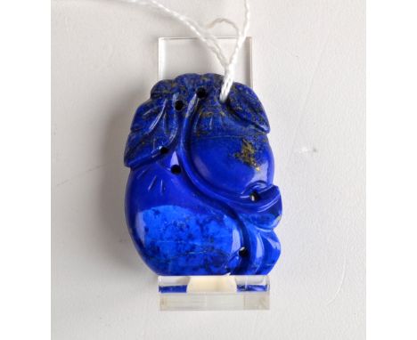 THE LESLIE DAVIE COLLECTION OF JADE

A lapis pendant carved with a fruiting branch, late 19th or 20th century, 3.2cm.