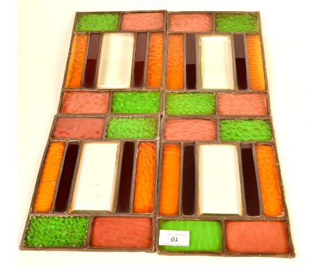 A set of four leaded coloured glass panels from a hall lantern.