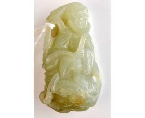 THE LESLIE DAVIE COLLECTION OF JADE

A mottled pale green jade carving of an immortal with a bat, height 4.8cm.
