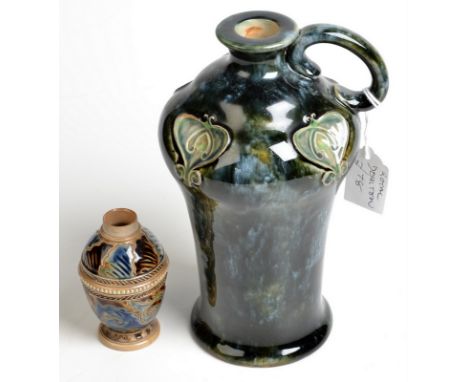A Royal Doulton stoneware flask, circa 1912, height 20cm. Together with a small Doulton Lambeth jar, indistinct initials, per