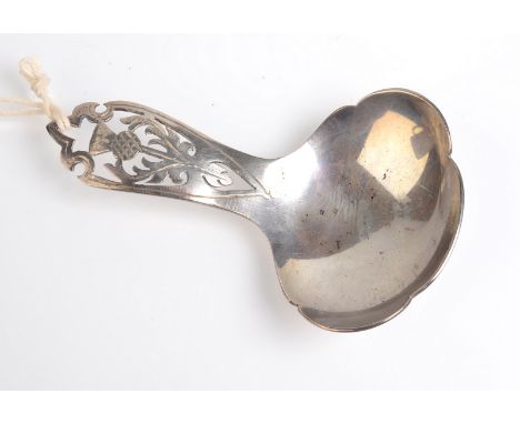 A pierced silver caddy spoon.