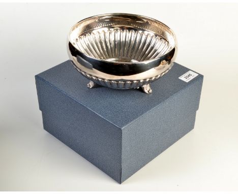 A Canadian demi-fluted circular silver bowl resting on three feet, stamped 'Birks Sterling', 382gms, diameter 19.5, boxed.