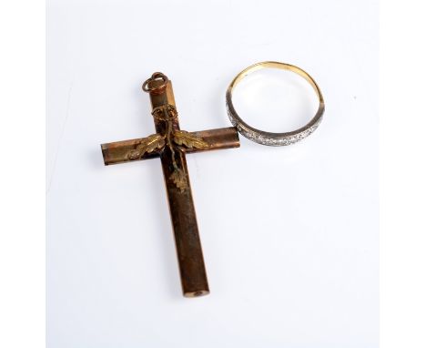 A Victorian gold cross and a gold ring set with diamonds. 