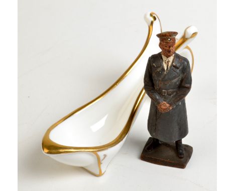 An Elastolin Lineo figure of Hitler together with an English China Clays Sales Company Ltd. gilt china pipe rest.