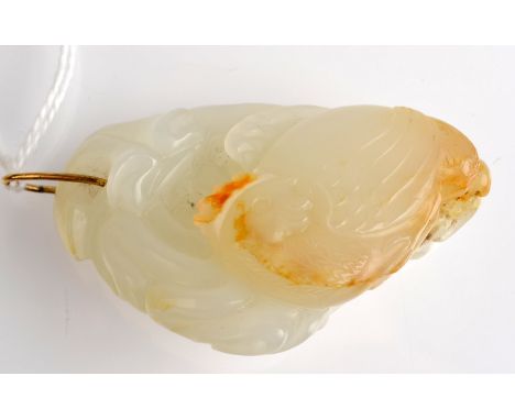 THE LESLIE DAVIE COLLECTION OF JADE

A white and russet jade pendant carved as a cockerel, probably 18th century, of triangul