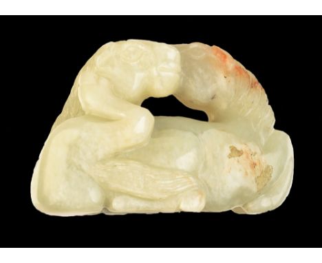 THE LESLIE DAVIE COLLECTION OF JADE

A mutton fat and russet jade, Ming style, but probably 19th century, carving of two recl
