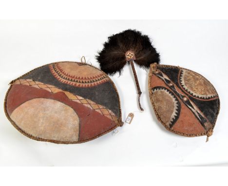 An African fan and two African shields, etc.