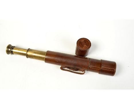 A four centimetre brass and leather bound three draw 25x telescope by Broadhurst, Clarkson & Co. Ltd.