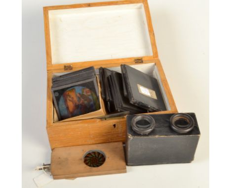 Glass magic lantern slides, a kaleidoscope chromotype animated small magic lantern slide together with a small collection of 