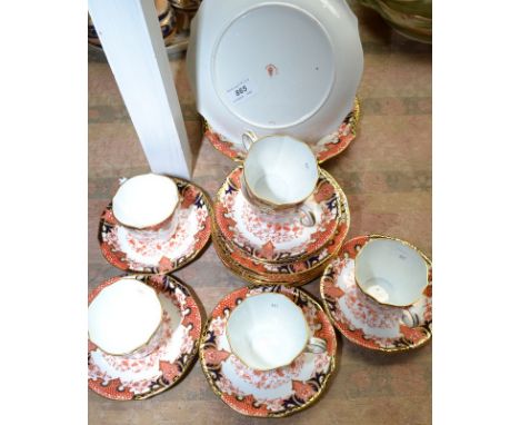 A Royal Crown Derby tea set with printed imari pattern, comprising 6 tea cups and saucers, 6 sandwich plates and two cake pla