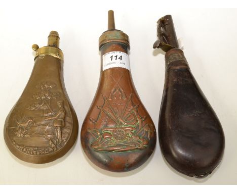 A leather and steel powder flask, a brass flask embossed with a military figure and dog and a copper flask.