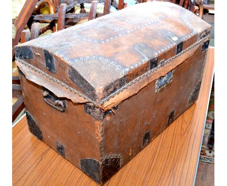 A Georgian style studded leather covered bone topped trunk with the initials I.H., width 66.5cm.