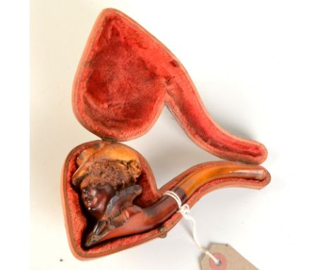 A meerschaum pipe the bowl carved with a fashionable hatted lady, fitted case. Condition Report: Signs of use, no cracks
